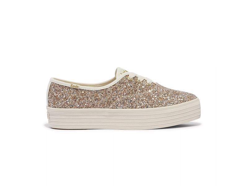 Keds top x Kate Spade gold sparkly daisy sneakers